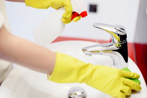 Trained cleaning staff using professional carpet cleaning equipment