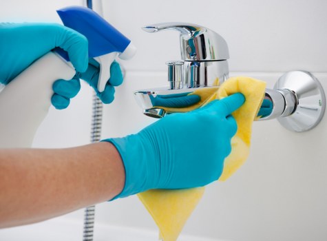Carpet cleaning operative preparing a treated area for drying